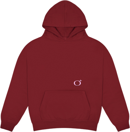 This is the Circleplus Hoodie in red / pink. It is laid flat in a uniform manner.